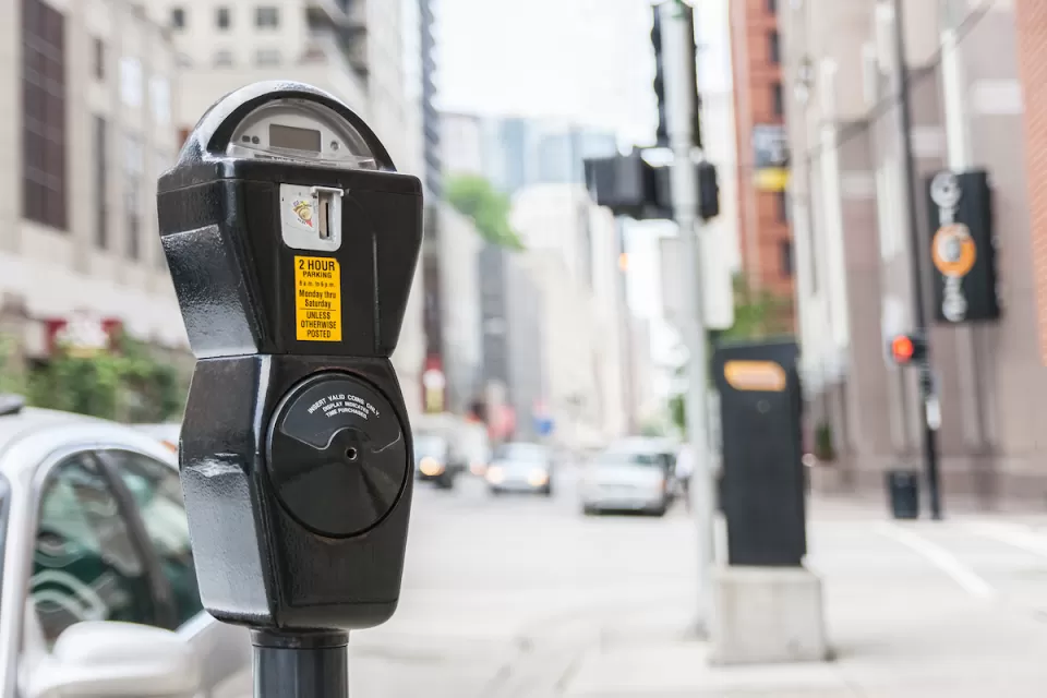 Close-up of standard grey parking meter on Chicago street.